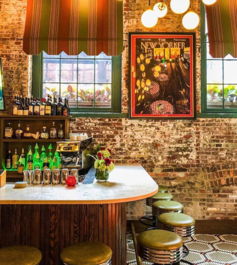 Exposed brick walls by the bar