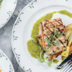 Herb crusted salmon and other dishes