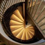 Gold spiral staircase to level two