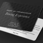 a black and white card with the words enjoy an unrivaled dining experience.